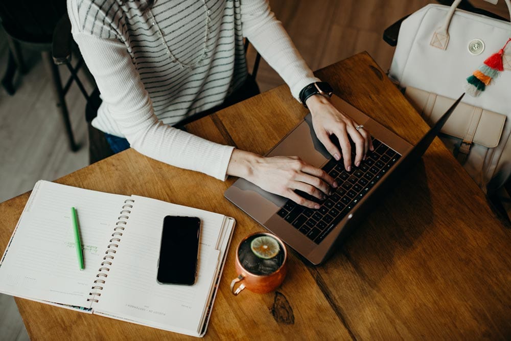 AdThrive team member working on laptop