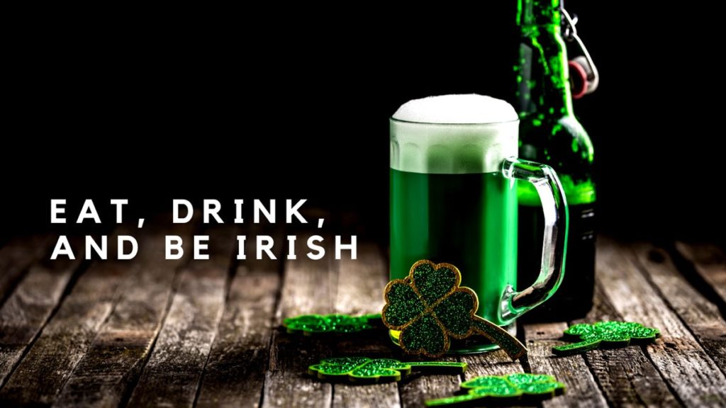 St. Patrick's Day table with greem beer and text that says