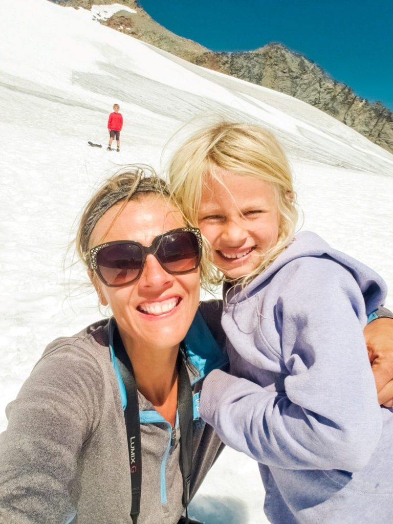 mom and kids on a glacier