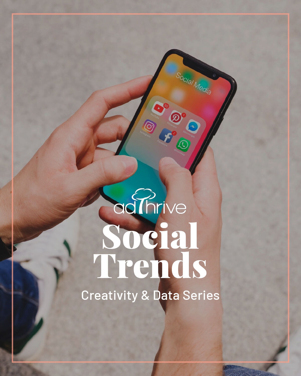 A top-down view of two hands holding a phone looking at social media icons advertising part 5 of AdThrive's creativity and data series