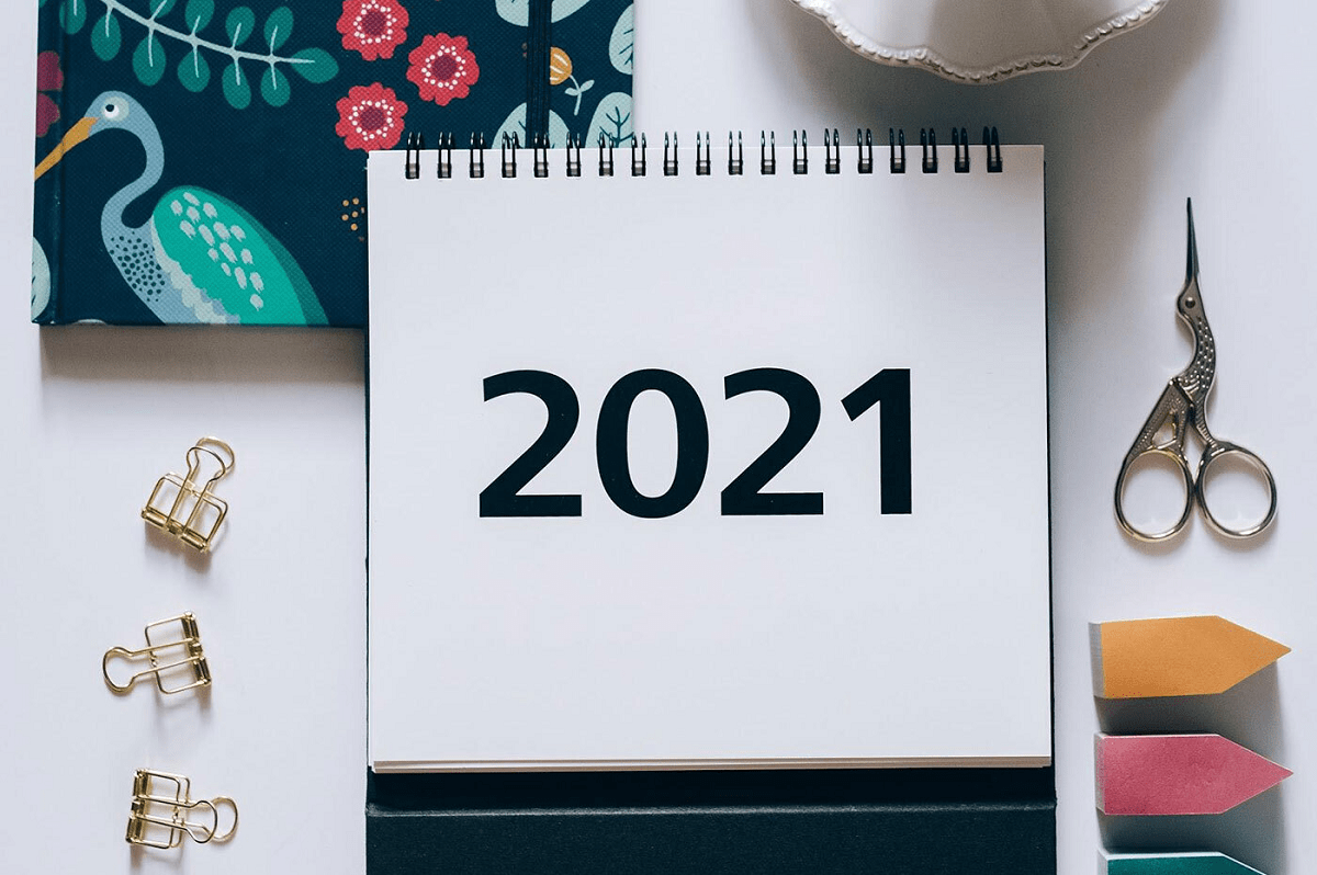 a 2021 bound calendar with craft accessories