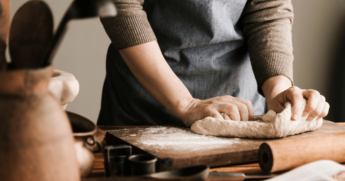 hands kneading bread