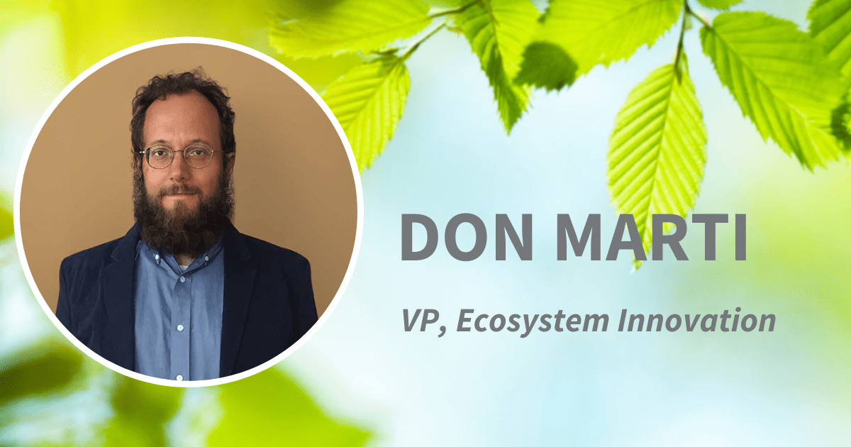 headshot of Don with his title set against a leaf background