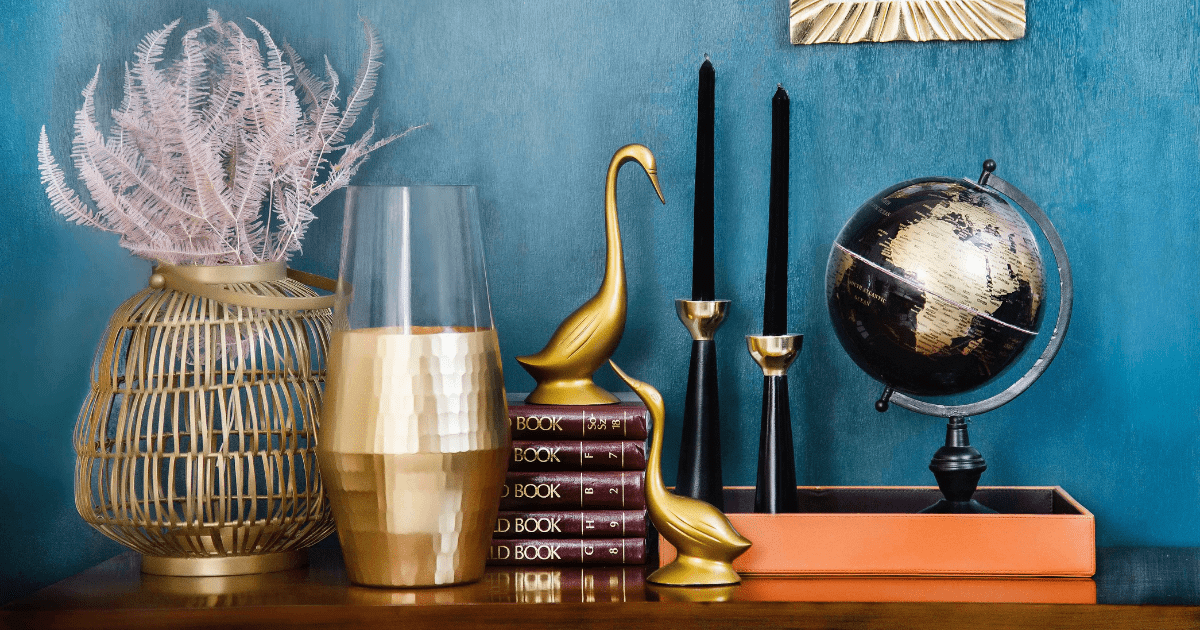 home decorations on top of a dresser