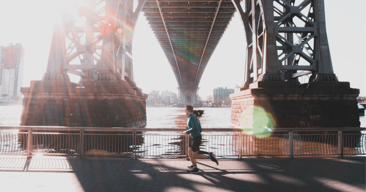 a woman running in the city
