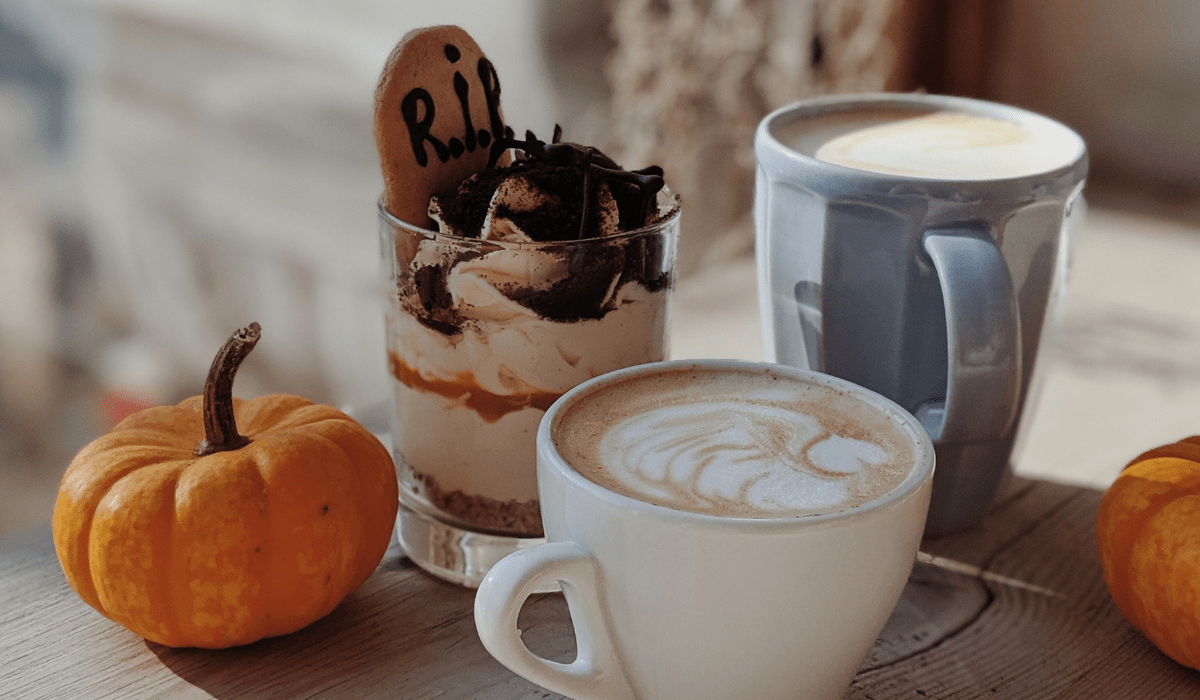 pumpkin and coffee mugs with fall decor