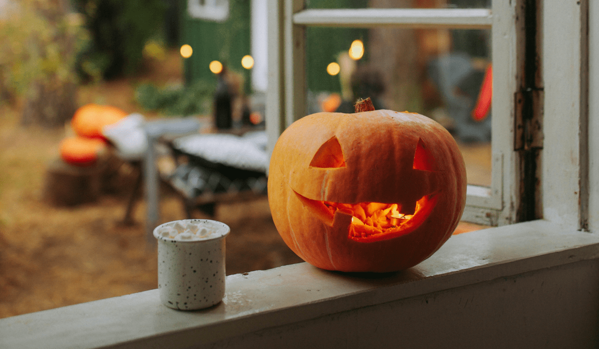 carved jack o lantern on a window ledge